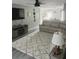 Open living room with gray walls, hardwood floors, and comfortable seating at 319 Bradley Bend Dr, Moncks Corner, SC 29461