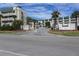 Inviting coastal condo building with gated entrance and ample parking at 3701 Docksite Rd # 320, Edisto Beach, SC 29438