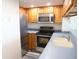 Modern kitchen with stainless steel appliances and light blue countertops at 3701 Docksite Rd # 320, Edisto Beach, SC 29438
