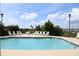 Community pool with ample lounge chairs, perfect for relaxation at 3701 Docksite Rd # 320, Edisto Beach, SC 29438