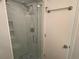 Updated shower with marble-look tiles and glass enclosure at 3701 Docksite Rd # 320, Edisto Beach, SC 29438