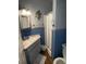 Bathroom with shower, sink, and coastal decor at 506 Jungle Rd, Edisto Island, SC 29438