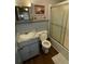Clean bathroom featuring a shower/tub combo, toilet and vanity with marble top at 506 Jungle Rd, Edisto Island, SC 29438