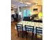 Dining area with table and chairs, adjacent to living room at 506 Jungle Rd, Edisto Island, SC 29438