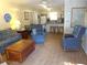Living room with comfy seating and access to deck at 506 Jungle Rd, Edisto Island, SC 29438