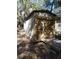Wooden storage shed with double doors and ramp at 506 Jungle Rd, Edisto Island, SC 29438