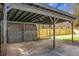 Covered patio and storage shed in the backyard at 5259 Hartford Cir, North Charleston, SC 29405