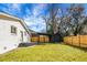Backyard with a wooden fence, shed, and covered patio at 5259 Hartford Cir, North Charleston, SC 29405