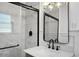 Contemporary bathroom with marble shower, gray vanity, and modern lighting at 5259 Hartford Cir, North Charleston, SC 29405