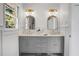 Double vanity bathroom with gray cabinets and gold accents at 5259 Hartford Cir, North Charleston, SC 29405