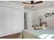 Bedroom with light green bedding and large closet at 5259 Hartford Cir, North Charleston, SC 29405