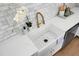 Farmhouse sink with gold faucet and marble countertop at 5259 Hartford Cir, North Charleston, SC 29405