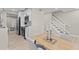 Modern dining room adjacent to the kitchen with a light wood table at 944 Beresford Ct # C, Mount Pleasant, SC 29464