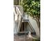 Exterior basement entrance with brick patio and landscaping at 99 Tradd St, Charleston, SC 29401