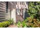 Private garden gate with decorative metalwork at 99 Tradd St, Charleston, SC 29401