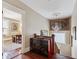 Upper hallway with hardwood floors and built-in storage at 99 Tradd St, Charleston, SC 29401