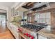 Stainless steel range and granite countertops in a modern kitchen at 99 Tradd St, Charleston, SC 29401