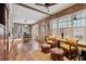 Open kitchen with exposed brick and hardwood floors at 99 Tradd St, Charleston, SC 29401