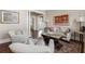 Living room with hardwood floors, neutral tones, and comfortable seating at 99 Tradd St, Charleston, SC 29401