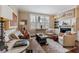 Elegant living room with comfortable seating, fireplace, and built-in shelves at 99 Tradd St, Charleston, SC 29401