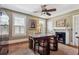 Home office with hardwood floors, fireplace, and antique furniture at 99 Tradd St, Charleston, SC 29401