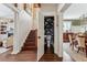 Hidden powder room with dark floral wallpaper and pedestal sink at 99 Tradd St, Charleston, SC 29401