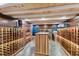 Impressive wine cellar with wooden racks and brick walls at 99 Tradd St, Charleston, SC 29401