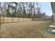 Large backyard with wooden privacy fence at 9991 Winged Elm St, Ladson, SC 29456