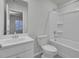 Clean bathroom with white vanity, toilet, and bathtub at 9991 Winged Elm St, Ladson, SC 29456