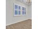 Bright dining room with hardwood floors and white walls at 9991 Winged Elm St, Ladson, SC 29456