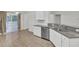 Modern kitchen with stainless steel appliances and granite countertops at 9991 Winged Elm St, Ladson, SC 29456