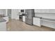 Spacious kitchen featuring stainless steel appliances and ample cabinet space at 9991 Winged Elm St, Ladson, SC 29456