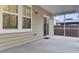 Covered patio adjacent to house and screened porch at 9991 Winged Elm St, Ladson, SC 29456