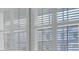 White plantation shutters on window at 9991 Winged Elm St, Ladson, SC 29456