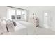 Bright and airy bedroom with a king-size bed and en-suite bathroom access at 1073 Keeper Ln, Summerville, SC 29485