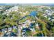 Aerial view of a neighborhood with houses, marsh, and waterways at 109 Historic Dr, Mount Pleasant, SC 29464