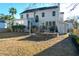 Large backyard with patio, fire pit, and house at 109 Historic Dr, Mount Pleasant, SC 29464