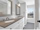 Double sink bathroom with granite countertop and large mirror at 109 Historic Dr, Mount Pleasant, SC 29464