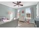 Charming bedroom with light green walls and plenty of natural light at 109 Historic Dr, Mount Pleasant, SC 29464