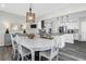 Elegant dining room with a whitewashed table and seating for six at 109 Historic Dr, Mount Pleasant, SC 29464