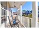 Relaxing front porch with rocking chairs, offering views of the neighborhood at 109 Historic Dr, Mount Pleasant, SC 29464