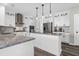 Updated kitchen featuring white cabinets, granite countertops, and stainless steel appliances at 109 Historic Dr, Mount Pleasant, SC 29464