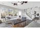 Open living space with hardwood floors, white couch, and kitchen views at 109 Historic Dr, Mount Pleasant, SC 29464
