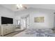 Main bedroom with large TV, ceiling fan, and ample closet space at 109 Historic Dr, Mount Pleasant, SC 29464