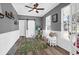 Bright playroom with built-in shelving and hardwood floors at 109 Historic Dr, Mount Pleasant, SC 29464