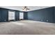 Large bedroom with blue walls and plush carpeting at 114 Avalon Rd, Summerville, SC 29483