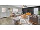 Living room with gray sofas, a large TV, and a wood accent wall at 114 Avalon Rd, Summerville, SC 29483
