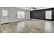 Open living room with gray walls and wood-look floors at 114 Avalon Rd, Summerville, SC 29483