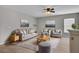 Spacious living room with comfy seating and large windows at 114 Avalon Rd, Summerville, SC 29483