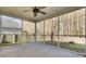 Screened porch overlooking backyard with wooden fence at 114 Avalon Rd, Summerville, SC 29483